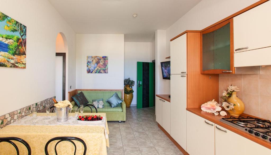 A kitchen or kitchenette at Residence Costa