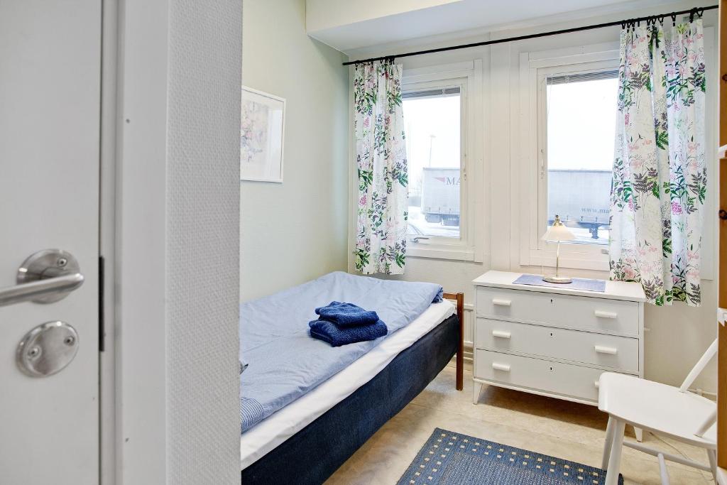 Postel nebo postele na pokoji v ubytování Bed's Motell & Rumsuthyrning