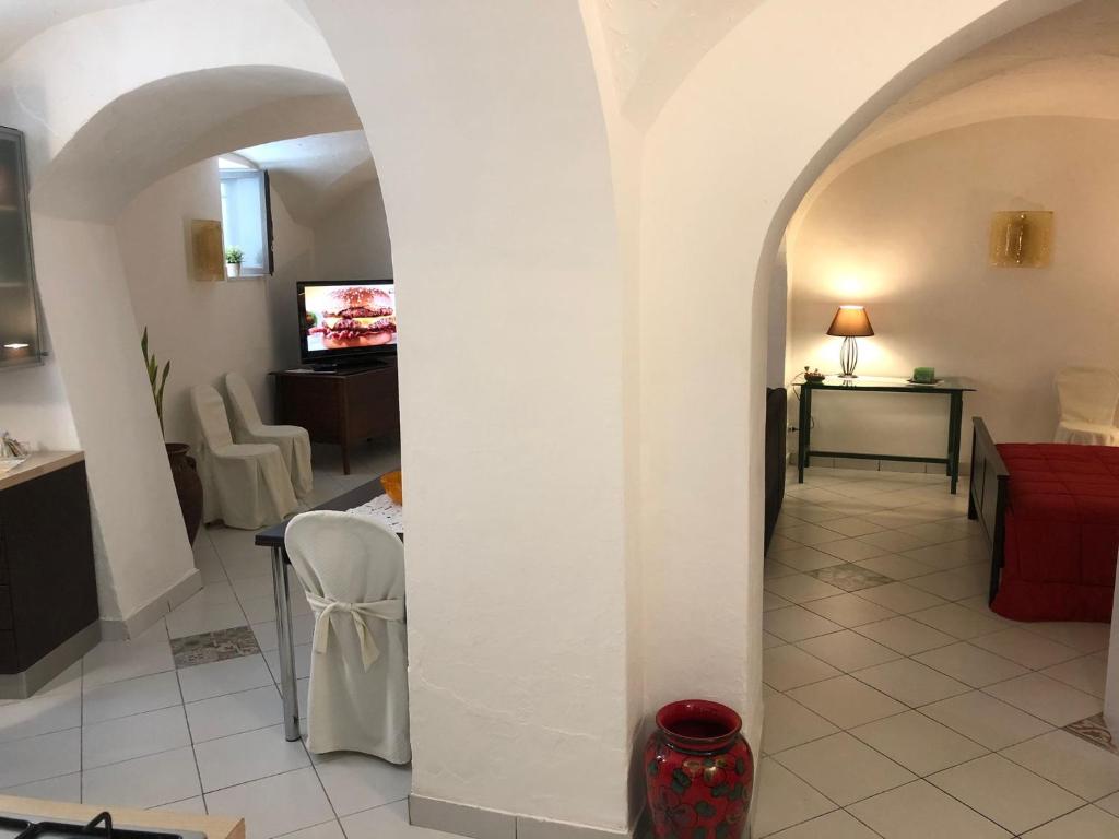 Televízia a/alebo spoločenská miestnosť v ubytovaní Casa Vacanze Gaia