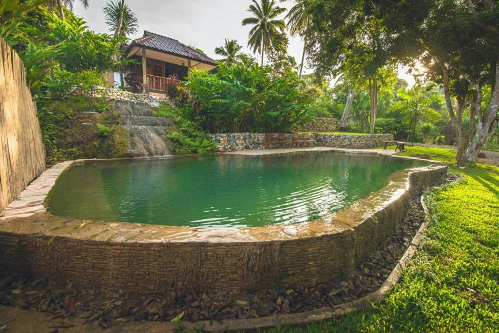 Zahrada ubytování NonKan HomeStay นอนกาญจน์ โฮมสเตย์