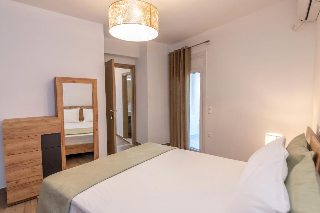 Postel nebo postele na pokoji v ubytování Villa Anemona Tinos