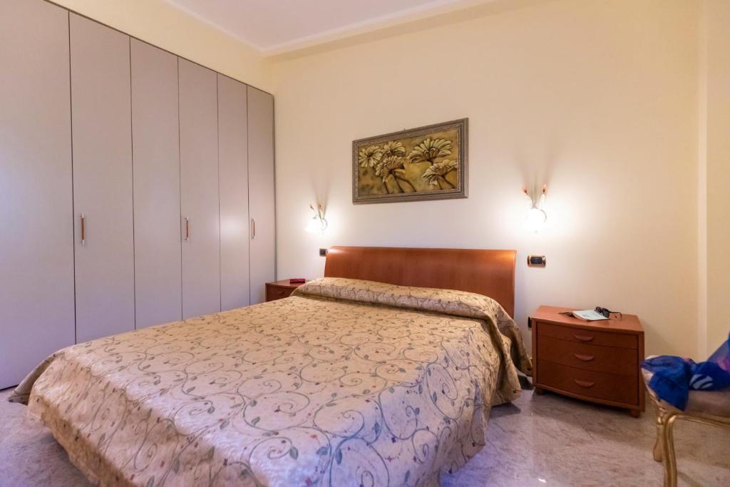 A bed or beds in a room at Villa Agave