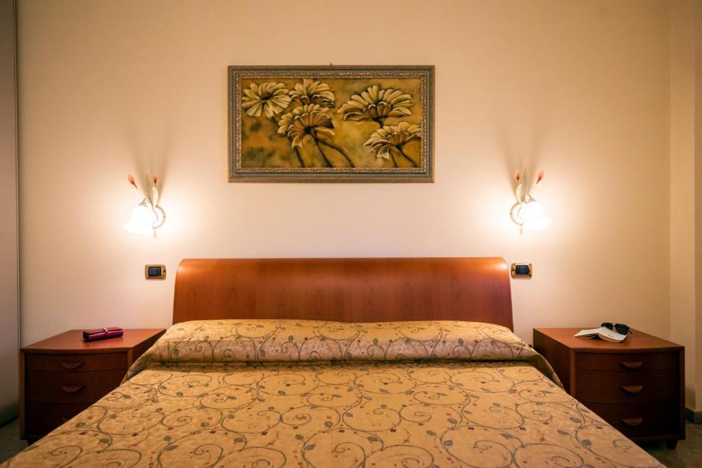 A bed or beds in a room at Villa Agave