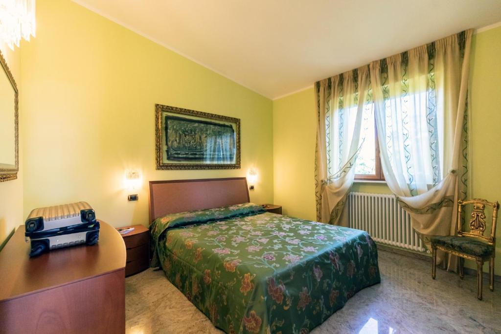A bed or beds in a room at Villa Agave