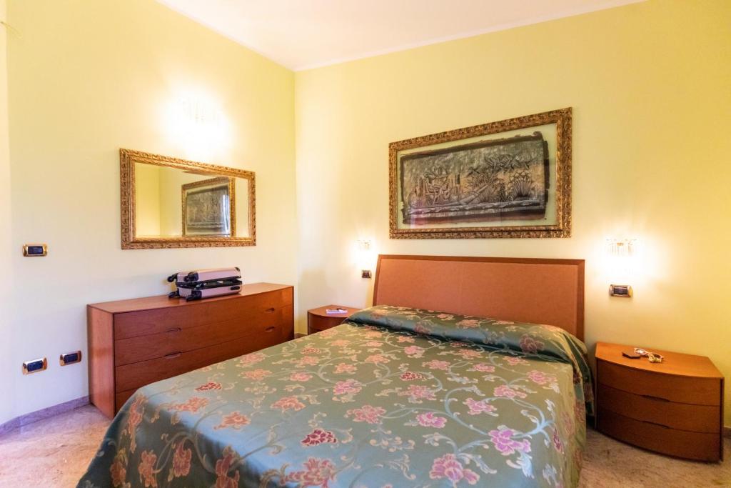 A bed or beds in a room at Villa Agave