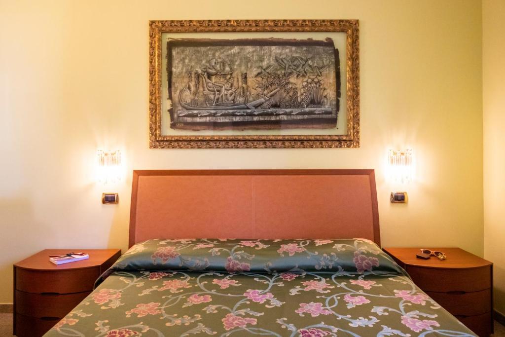 A bed or beds in a room at Villa Agave