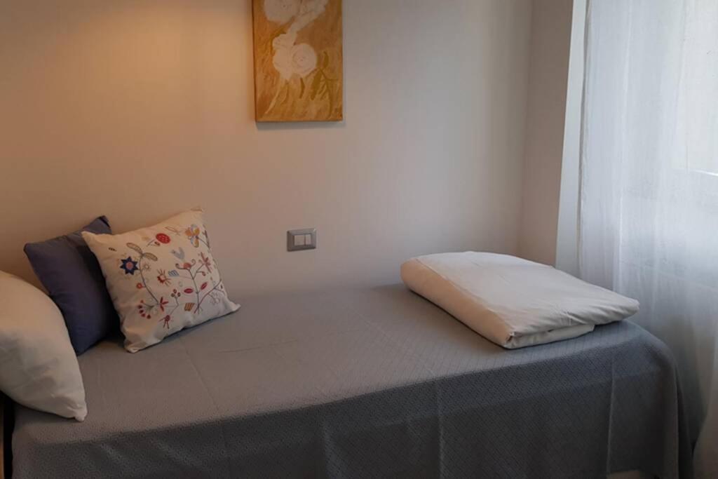 A bed or beds in a room at Bellagio Holiday Home
