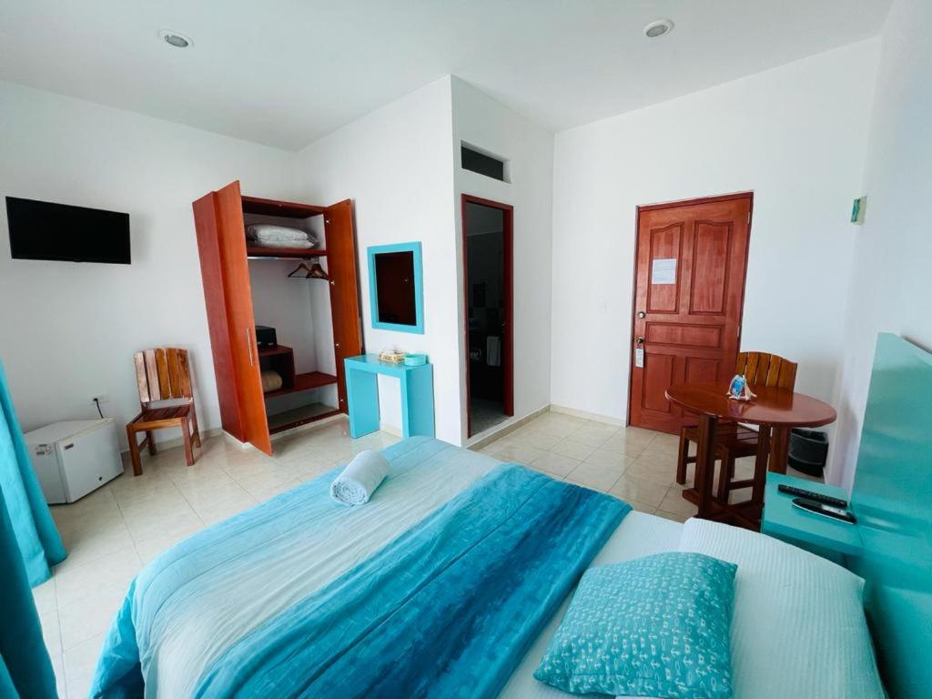 Postel nebo postele na pokoji v ubytování Habitación Amanecer Turquesa #5