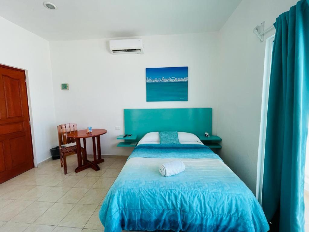 Postel nebo postele na pokoji v ubytování Habitación Amanecer Turquesa #5