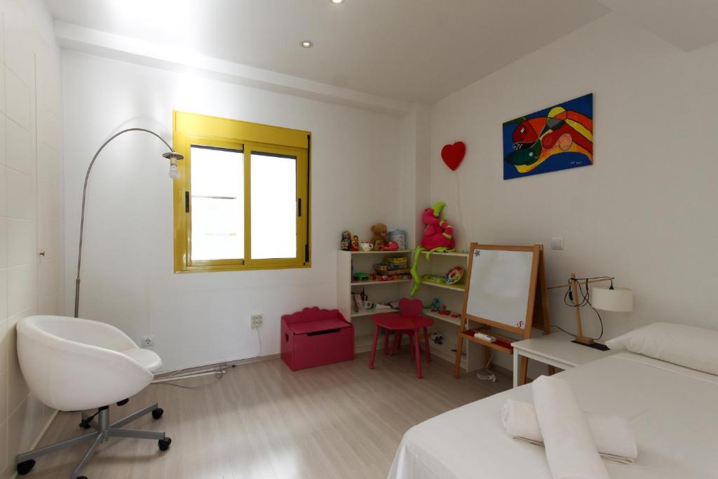 Posezení v ubytování Lagos del Castillo Atico Duplex con piscina privada by costablancarent