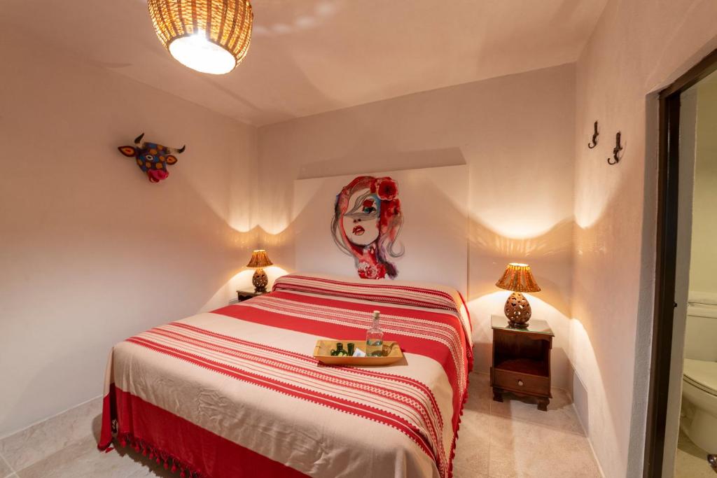 Postel nebo postele na pokoji v ubytování La Casa Carlota