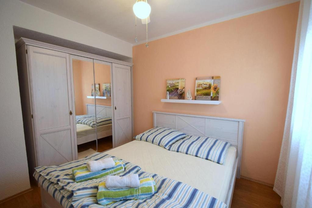 Posteľ alebo postele v izbe v ubytovaní Apartment Luis