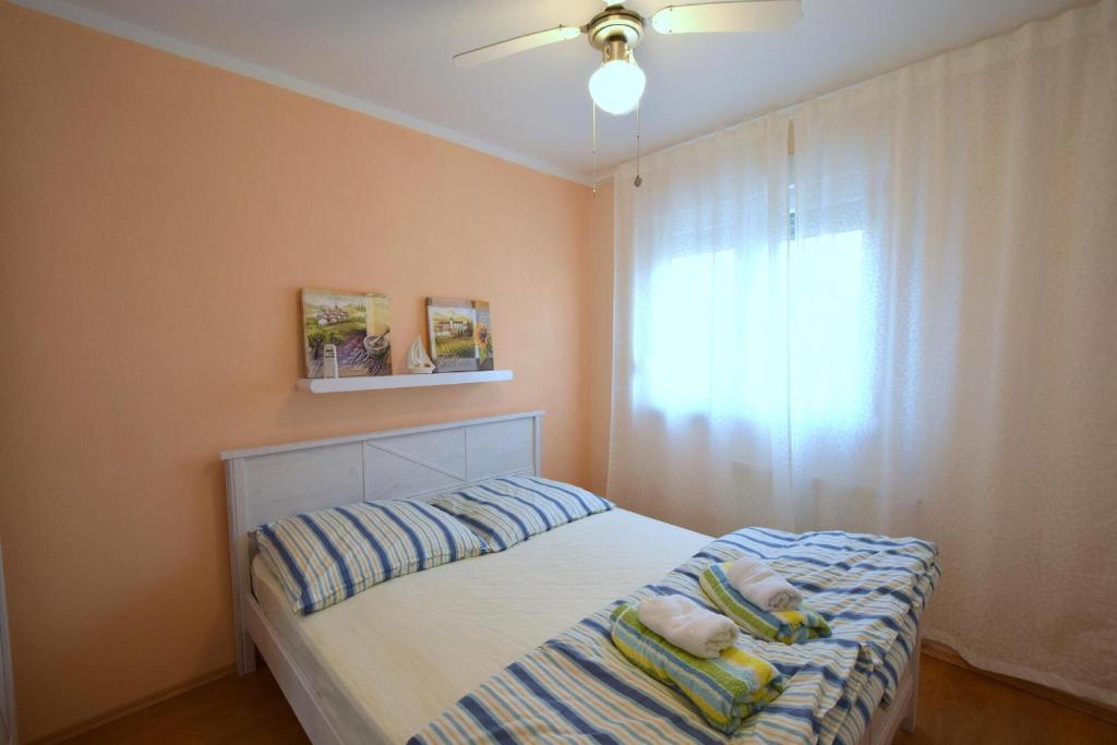Posteľ alebo postele v izbe v ubytovaní Apartment Luis