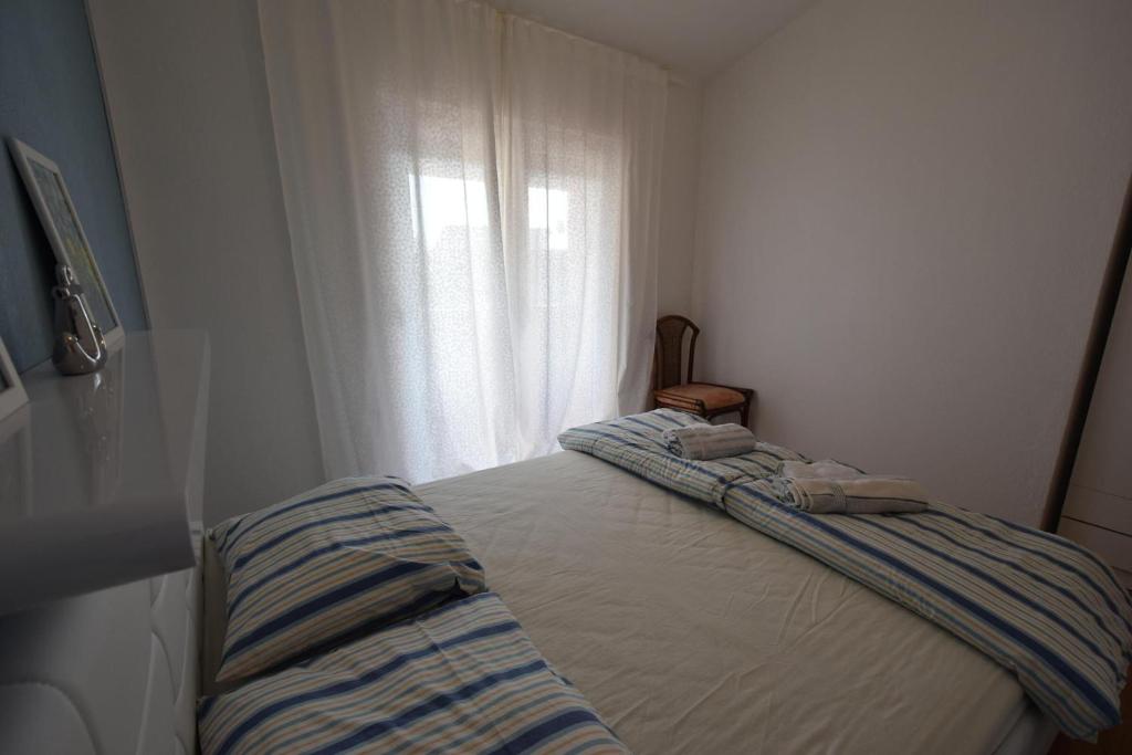 Posteľ alebo postele v izbe v ubytovaní Apartment Luis