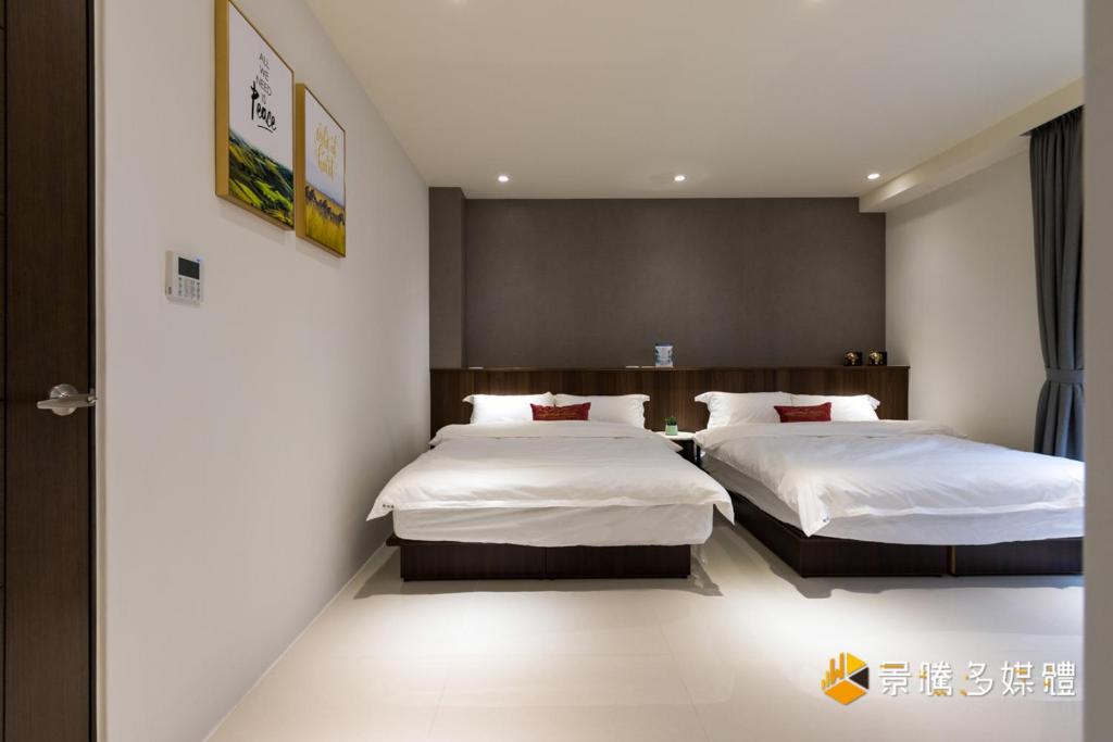 Voodi või voodid majutusasutuse 花蓮 Cozy Stay 舒適好宅 toas