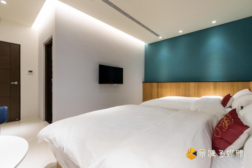 Voodi või voodid majutusasutuse 花蓮 Cozy Stay 舒適好宅 toas