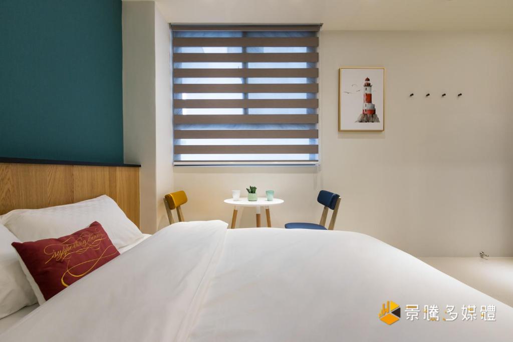 Voodi või voodid majutusasutuse 花蓮 Cozy Stay 舒適好宅 toas