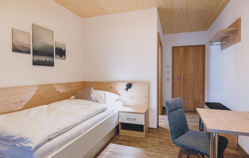 Postel nebo postele na pokoji v ubytování AlpenOase Sonnhof