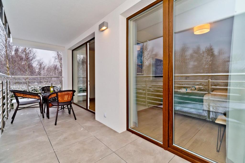 Balkón nebo terasa v ubytování BlueApart Apartamenty Na Klifie
