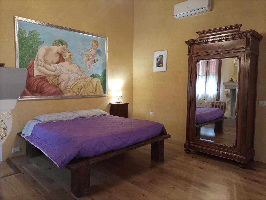 Łóżko lub łóżka w pokoju w obiekcie Antico Casale dei Sogni agriturismo