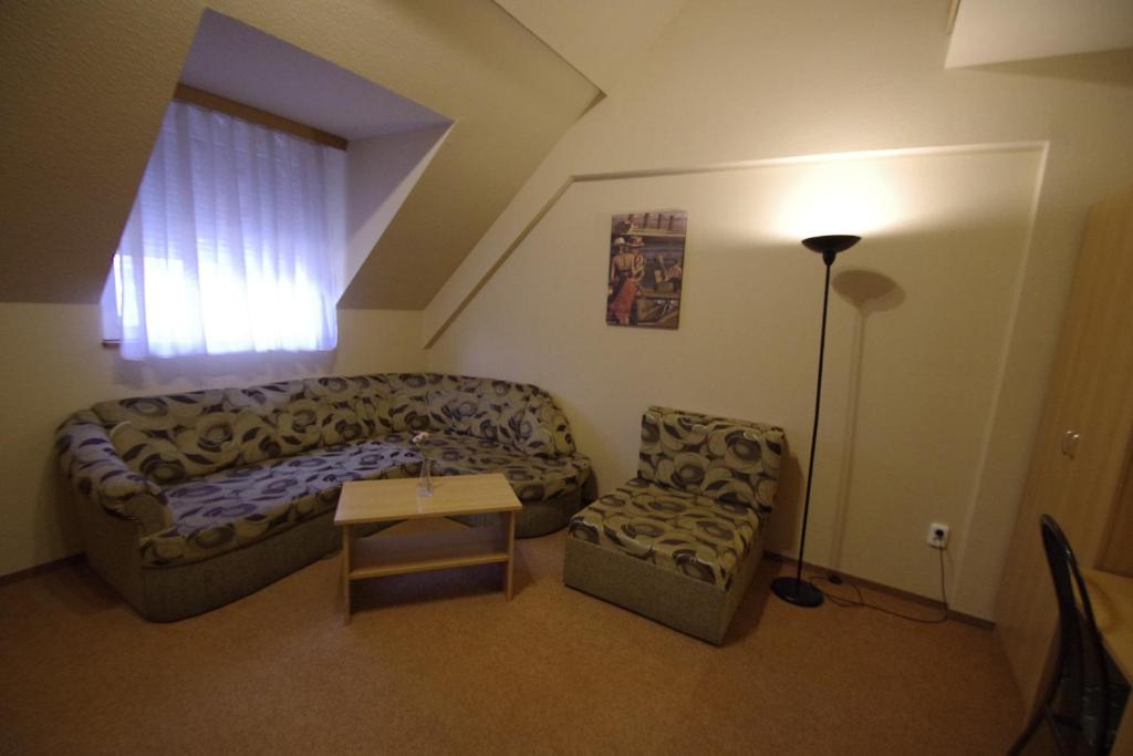 Posezení v ubytování Hotel Vadászkürt Superior