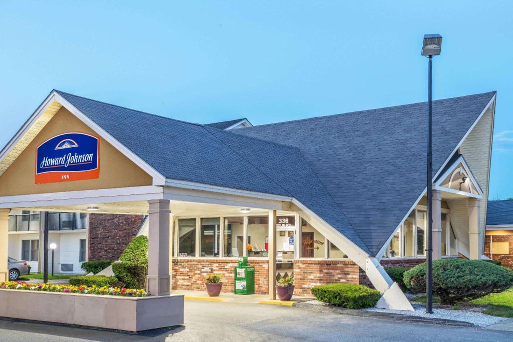 a library with a sign on the front of it at Howard Johnson by Wyndham Bangor in Bangor