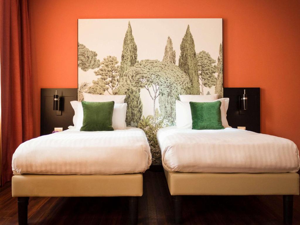 Posteľ alebo postele v izbe v ubytovaní Hotel Mercure Roma Corso Trieste