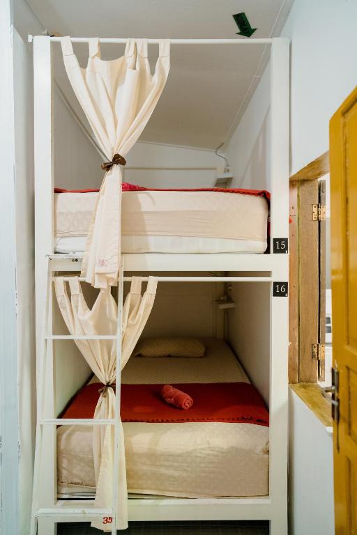 Postel nebo postele na pokoji v ubytování Otu Hostel By Ostic