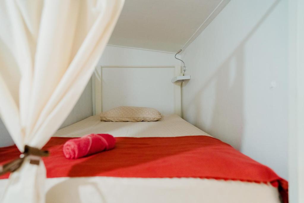Postel nebo postele na pokoji v ubytování Otu Hostel By Ostic