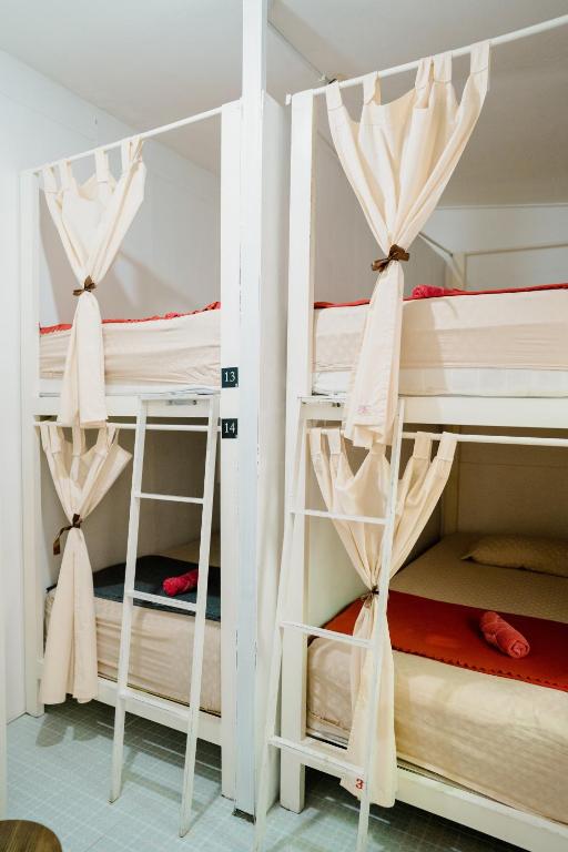 Postel nebo postele na pokoji v ubytování Otu Hostel By Ostic