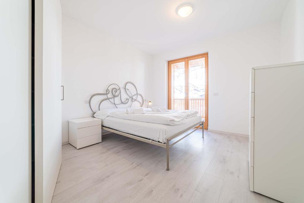 Łóżko lub łóżka w pokoju w obiekcie Olivia Home