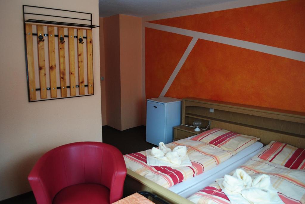 Postel nebo postele na pokoji v ubytování Pension Adolfshaide