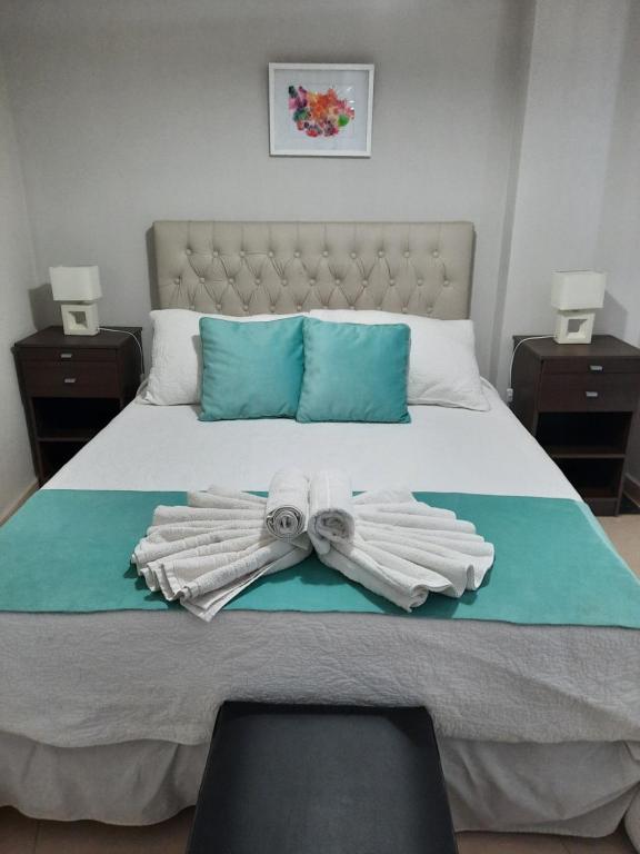 Una cama o camas en una habitación de Boulevard Lavalle Apartament