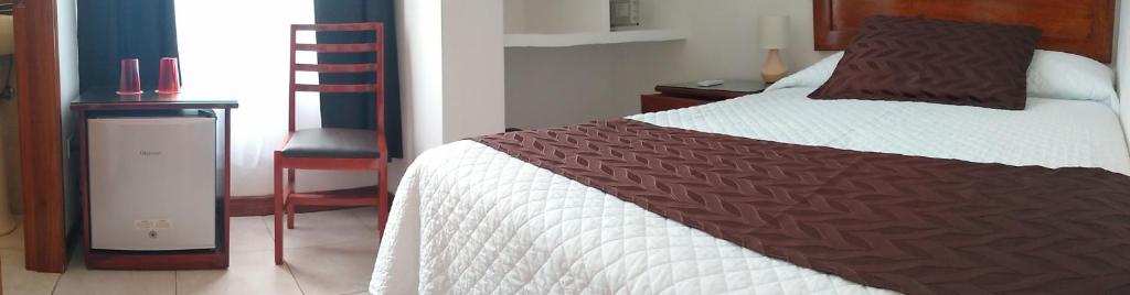 Postel nebo postele na pokoji v ubytování Drake Inn