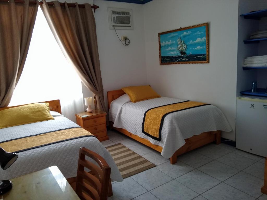 Postel nebo postele na pokoji v ubytování Drake Inn