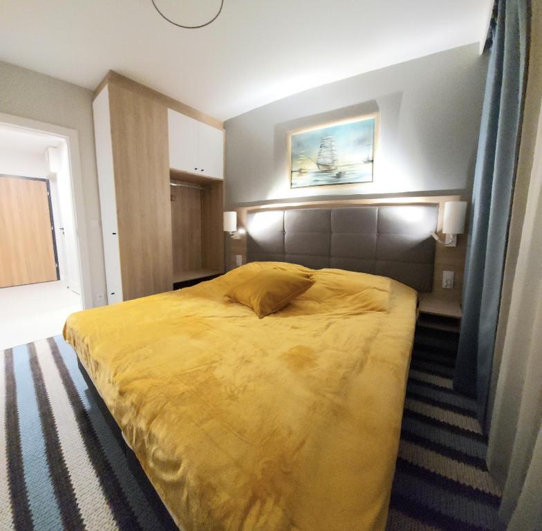 Posteľ alebo postele v izbe v ubytovaní Międzyzdroje - Bel Mare Resort - Apartament Prywatny LeBrosina