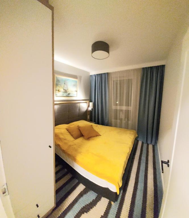 Posteľ alebo postele v izbe v ubytovaní Międzyzdroje - Bel Mare Resort - Apartament Prywatny LeBrosina
