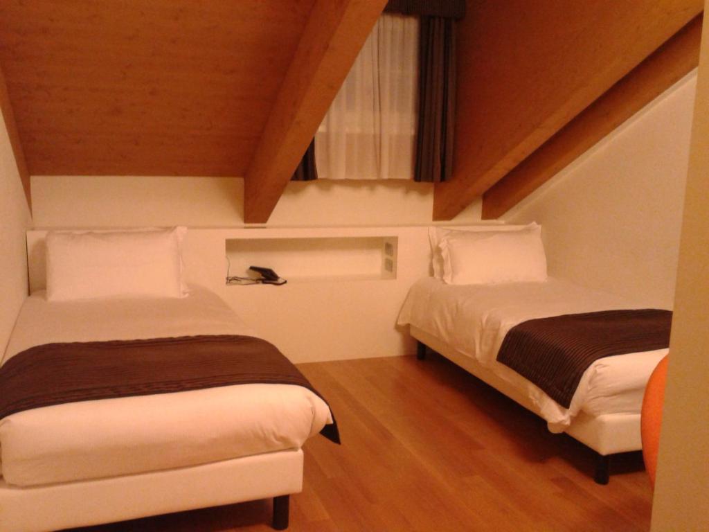 Posteľ alebo postele v izbe v ubytovaní Hotel Coppe Trieste - Boutique Hotel