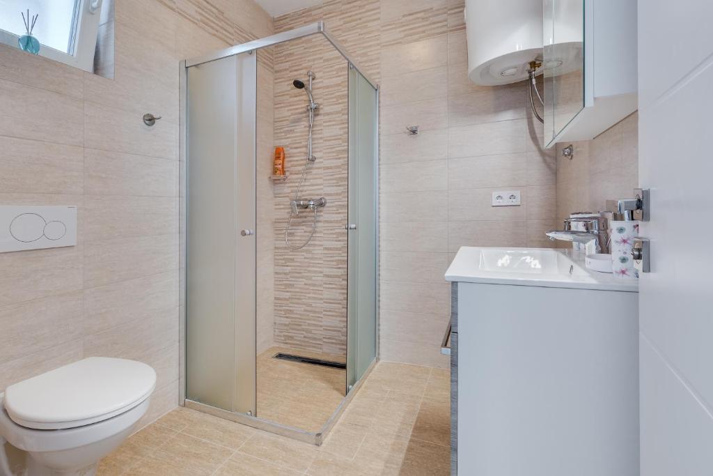 Kúpeľňa v ubytovaní Apartmani Kaštelina