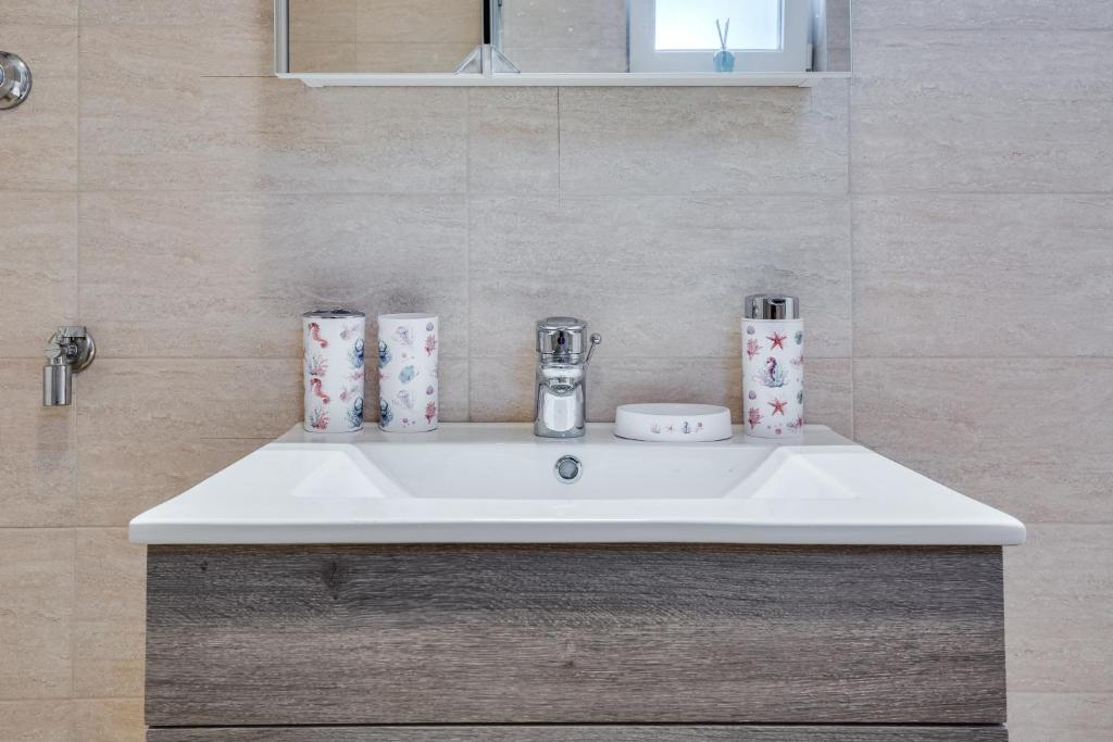 Kúpeľňa v ubytovaní Apartmani Kaštelina