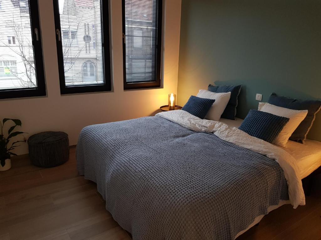 Postel nebo postele na pokoji v ubytování Vakantiewoning Ijzerfront 14-18