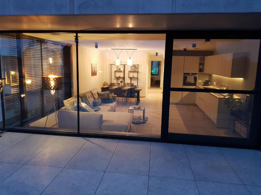 Kuchyň nebo kuchyňský kout v ubytování Vakantiewoning Ijzerfront 14-18