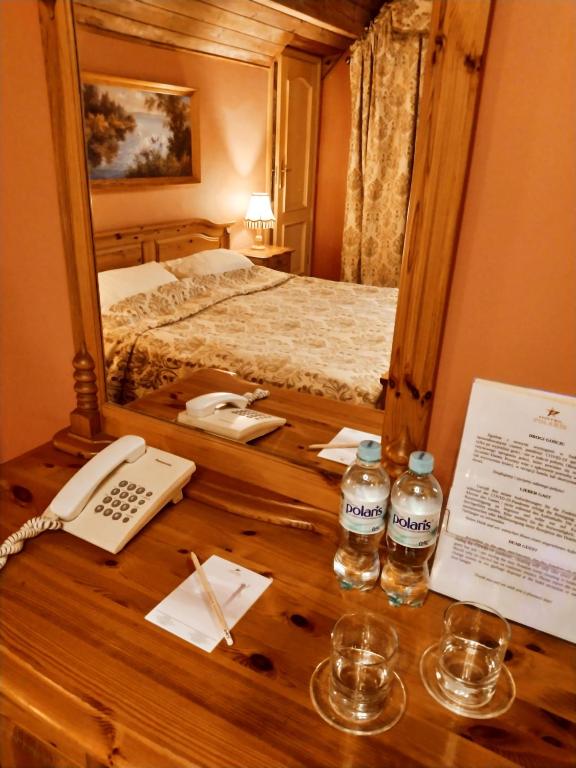 Postel nebo postele na pokoji v ubytování Hotel Polaris