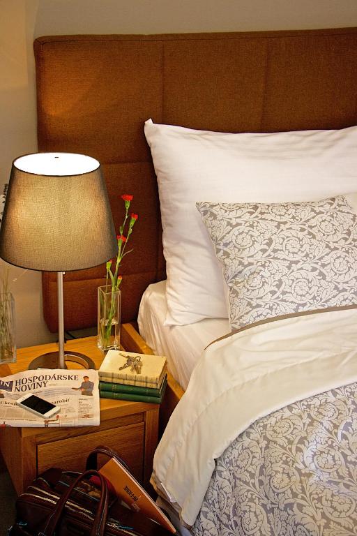 Postel nebo postele na pokoji v ubytování Hotel Marathon