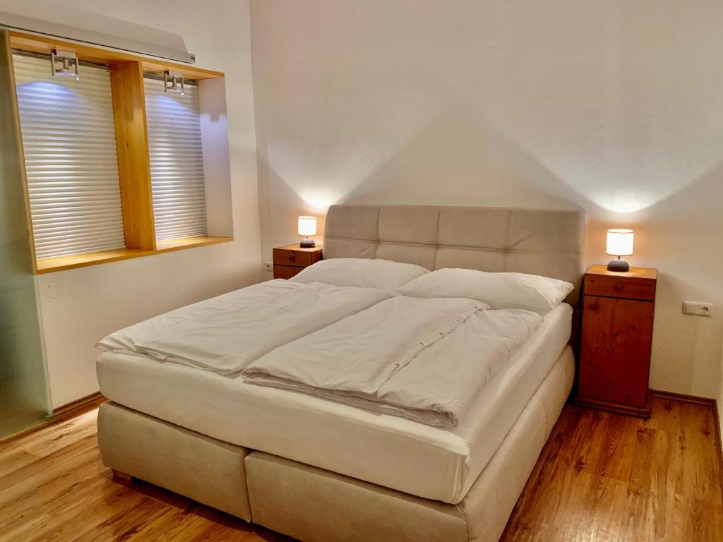 Ένα ή περισσότερα κρεβάτια σε δωμάτιο στο Apartment Loidl Ebensee