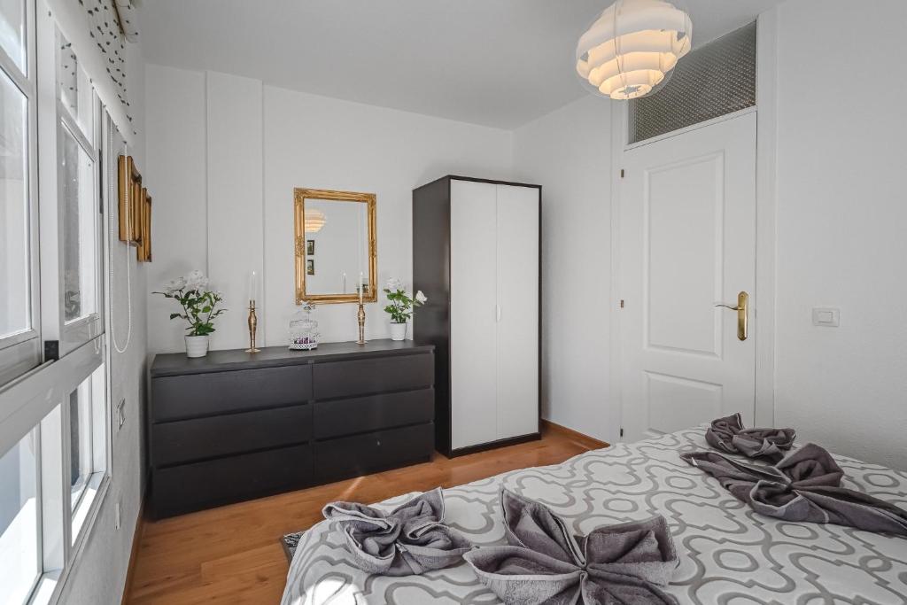 Posteľ alebo postele v izbe v ubytovaní Penthouse Apartment With Ocean View