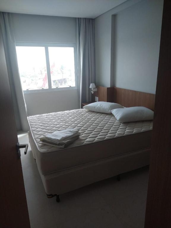 Postel nebo postele na pokoji v ubytování SALINAS EXCLUSIVE RESORT