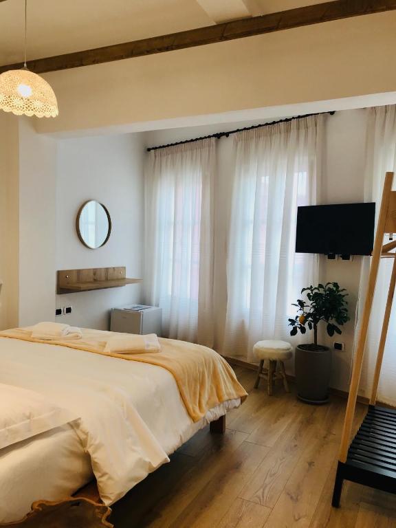 Postel nebo postele na pokoji v ubytování Foleza - Bed and breakfast