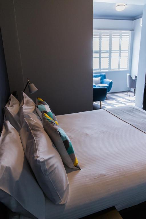 Postel nebo postele na pokoji v ubytování Hotel Canobolas
