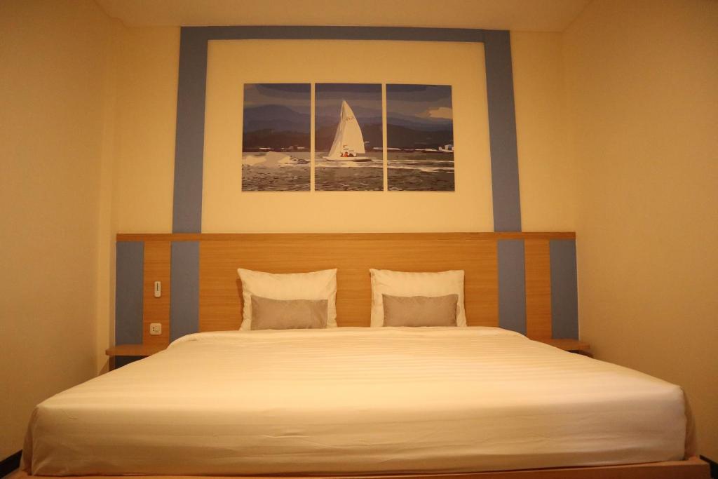 Postel nebo postele na pokoji v ubytování D'Carol Hotel